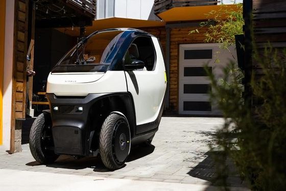 মিনি ইভি কার @ নিম্বাস ওয়ান একটি কমপ্যাক্ট, টিল্ট ইট্রিক যা শহুরে যাতায়াতের জন্য 50mph পর্যন্ত গতিতে সক্ষম