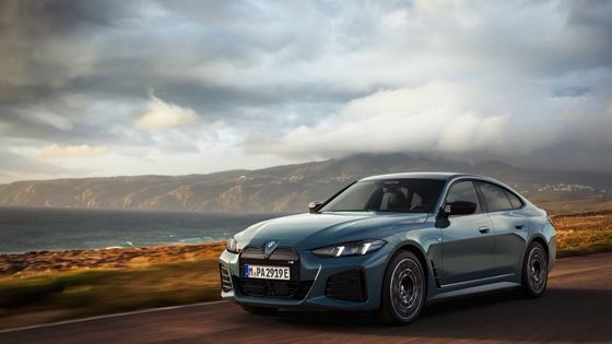 বিশুদ্ধ বৈদ্যুতিক গাড়ি উচ্চ পারফরম্যান্স 450km পরিসীমা বিএমডাব্লু আই 4 ত্বরণ 0-100km / h এ 3.9s 225km / h সর্বোচ্চ গতি 400kw শক্তি